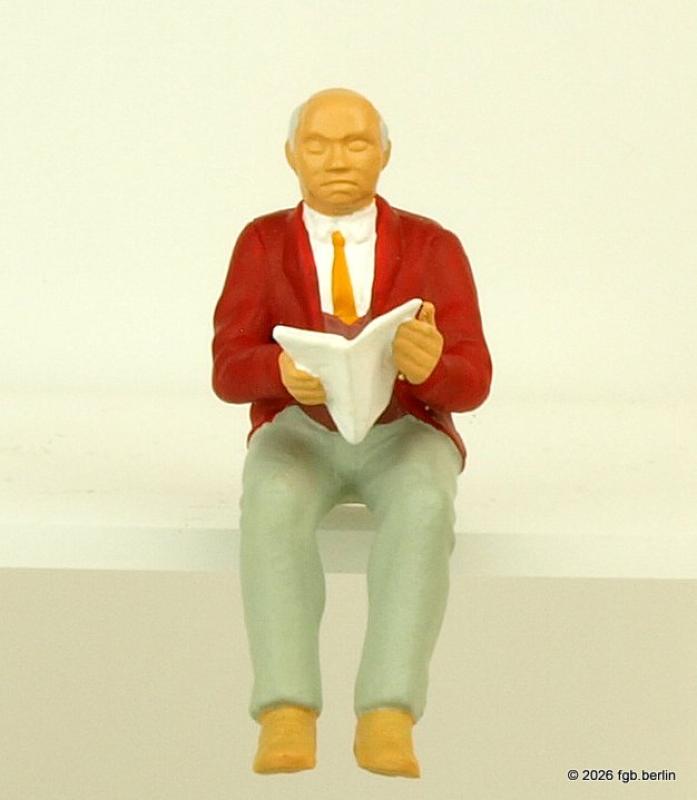 Merten 0240001 Sitzender Zeitungsleser